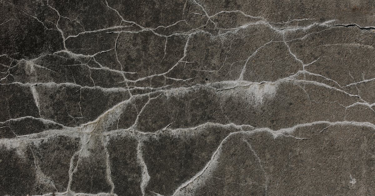 Pexels stock photo of cracked concrete used for foundation crack documentation research.